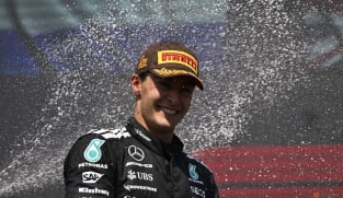 Russell wins in Canada as McLarens collide