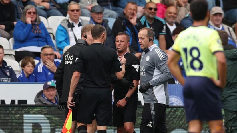 Referee Webb substituted due to head injury on Premier League debut