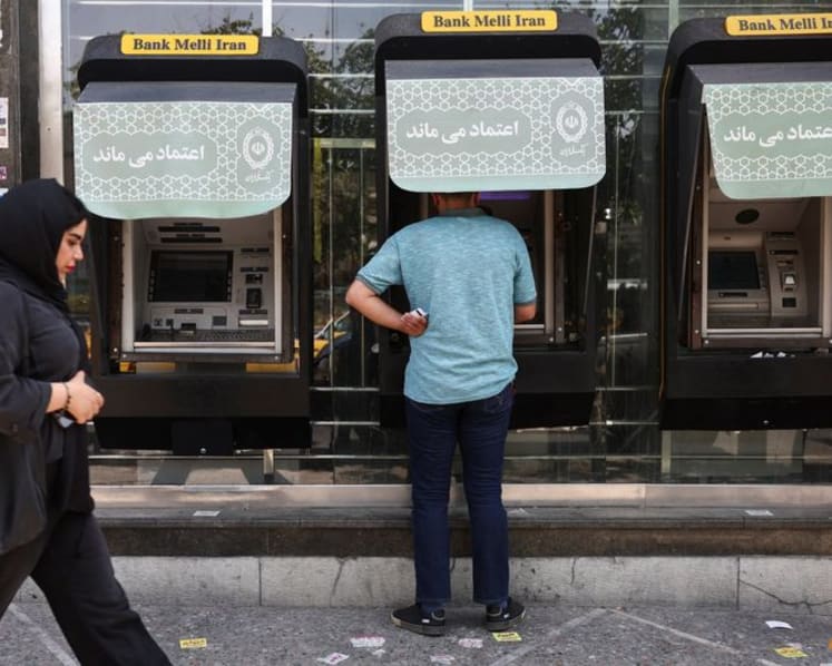 Iran says card-based banking hit by cyberattack on three lenders