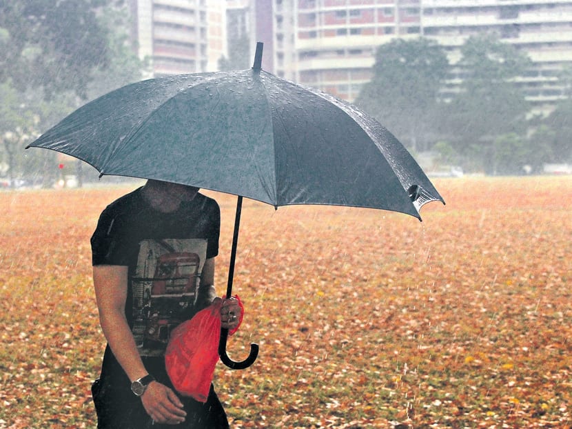 Rain brings relief to sweltering S’pore
