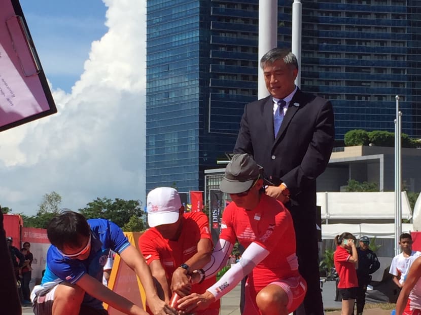 Ultramarathoners carry flame for SEA Games torch