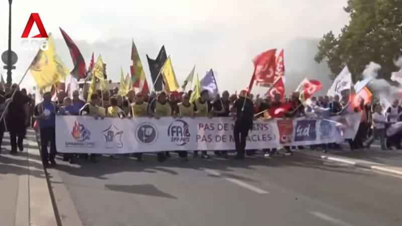 Hundreds detained in nationwide protests over French budget cuts 