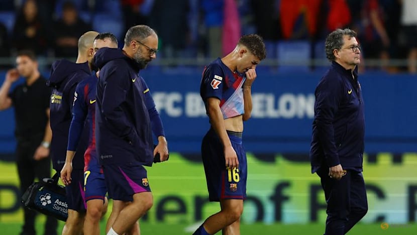 Barcelona's Lopez out for three weeks with muscle injury