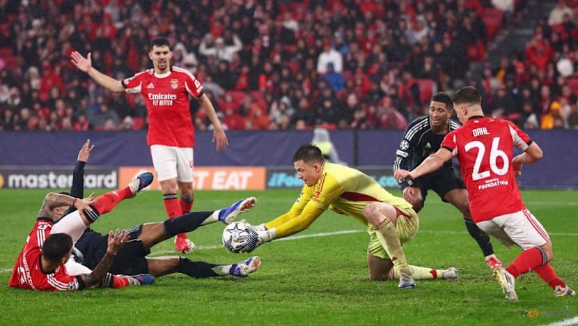 Goalkeeper scores at death to keep Benfica in Champions League with 4-2 win over Real Madrid