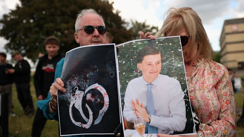 Watchdog probes two police after dying UK student handcuffed