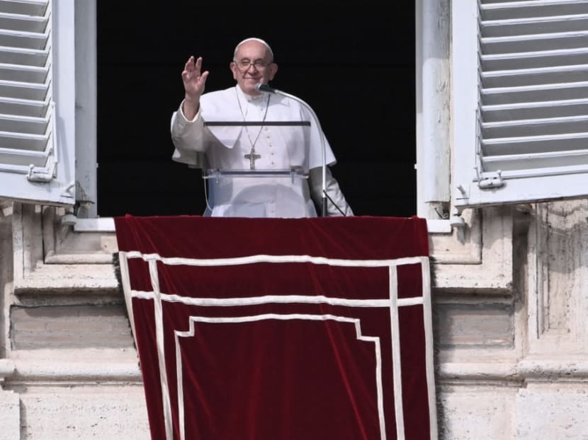 Pope Francis waves from the window of the apostolic palace overlooking St. Peter's square during the weekly Angelus prayer on October 29, 2023 in The Vatican. Pope Francis waves from the window of the apostolic palace overlooking St. Peter's square during the weekly Angelus prayer on October 29, 2023 in The Vatican.