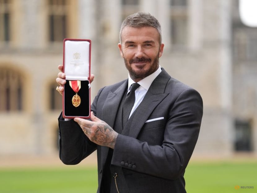 David Beckham knighted for services to sport and charity