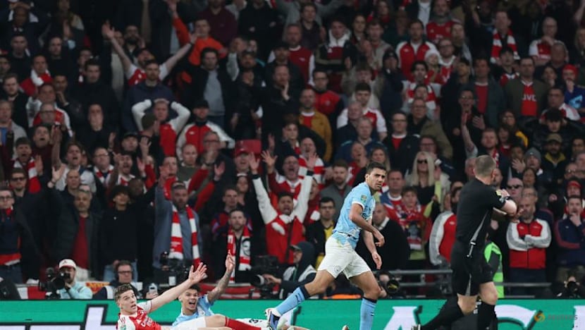 Man City cut Arsenal down to size as O'Reilly double seals League Cup final