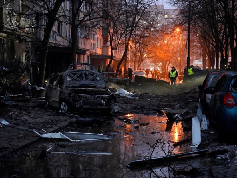 This photograph taken on Dec 13, 2023 shows destroyed cars next to a damaged residential building following a missile strike in Kyiv, amid Russian invasion of Ukraine. This photograph taken on Dec 13, 2023 shows destroyed cars next to a damaged residential building following a missile strike in Kyiv, amid Russian invasion of Ukraine.