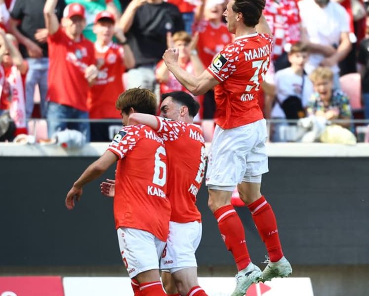 Olise and Kane lead Bayern comeback from three goals down in 4-3 win at Mainz
