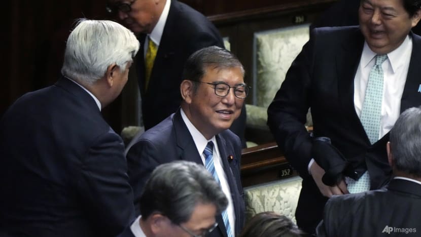 Japan PM Ishiba survives parliament vote as Trump looms large Japan PM Ishiba survives parliament vote as Trump looms large