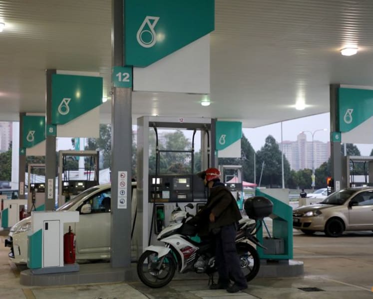 Malaysia to reinstate 300-litre monthly limit per citizen for RON95 transport fuel, PM says 