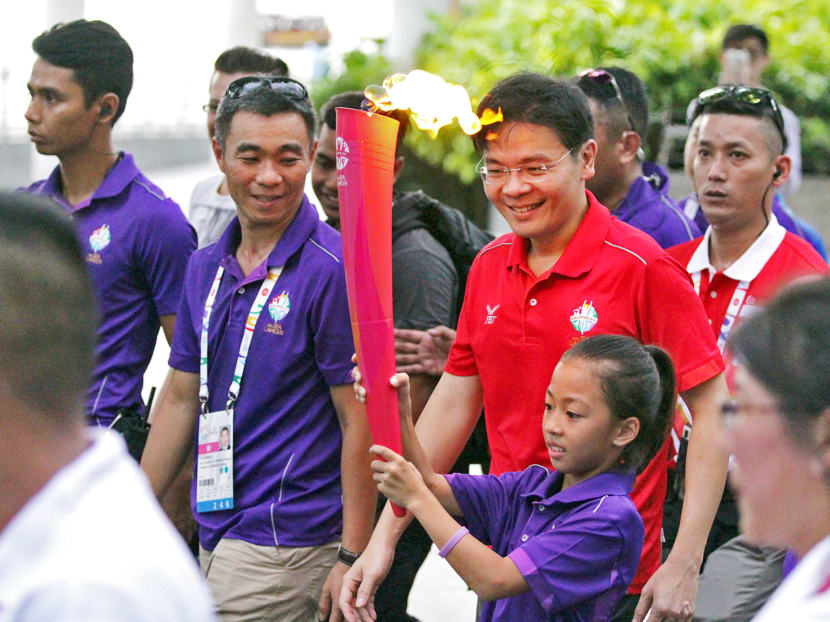 Ultramarathoners carry flame for SEA Games torch
