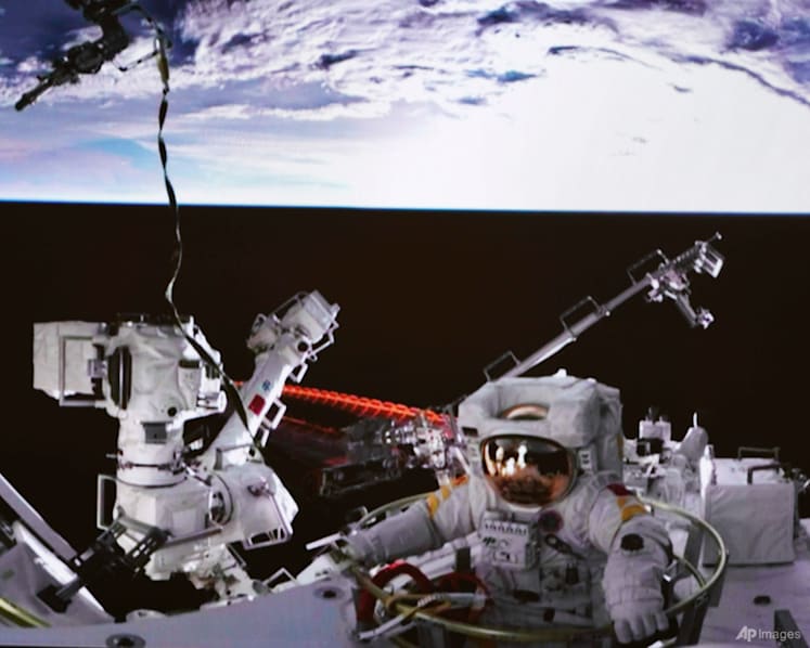 Chinese astronauts go on spacewalk from new station