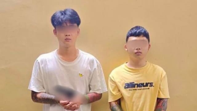 醉酒后掏出短枪 两名中国男子柬埔寨被捕