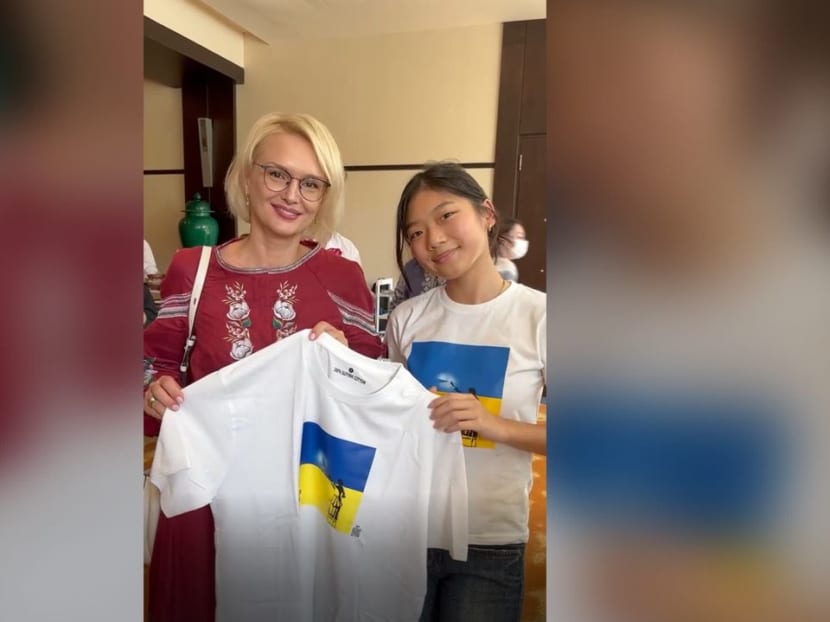Singaporean girl who designed T-shirt to help Ukraine 'shocked' when President Zelenskyy wore it Singaporean girl who designed T-shirt to help Ukraine 'shocked' when President Zelenskyy wore it