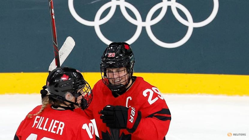 Ice hockey-Canada into semis, with Poulin back from injury and equalling scoring record