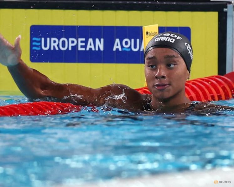 Italy's Curtis betters own 50m backstroke world record