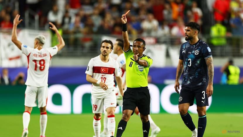 Paraguay's Almiron sent off for covering his mouth with his hand against Turkey