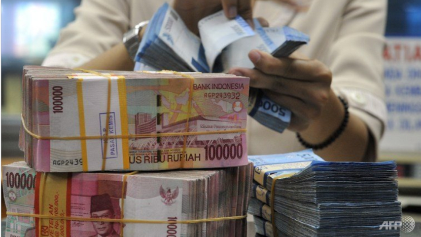 Indonesian fined for moving S$1.6 million across Singapore borders without declaring it Indonesian fined for moving S$1.6 million across Singapore borders without declaring it