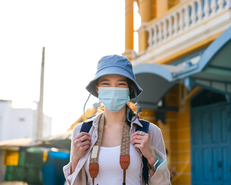 Commentary: Should you still go on holiday if you have COVID-19?