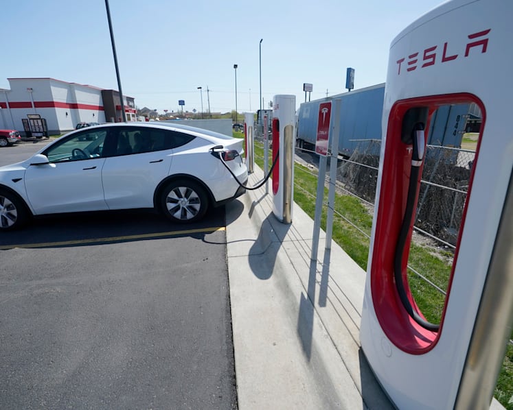 Tesla says it sold a record 1.3 million vehicles last year
