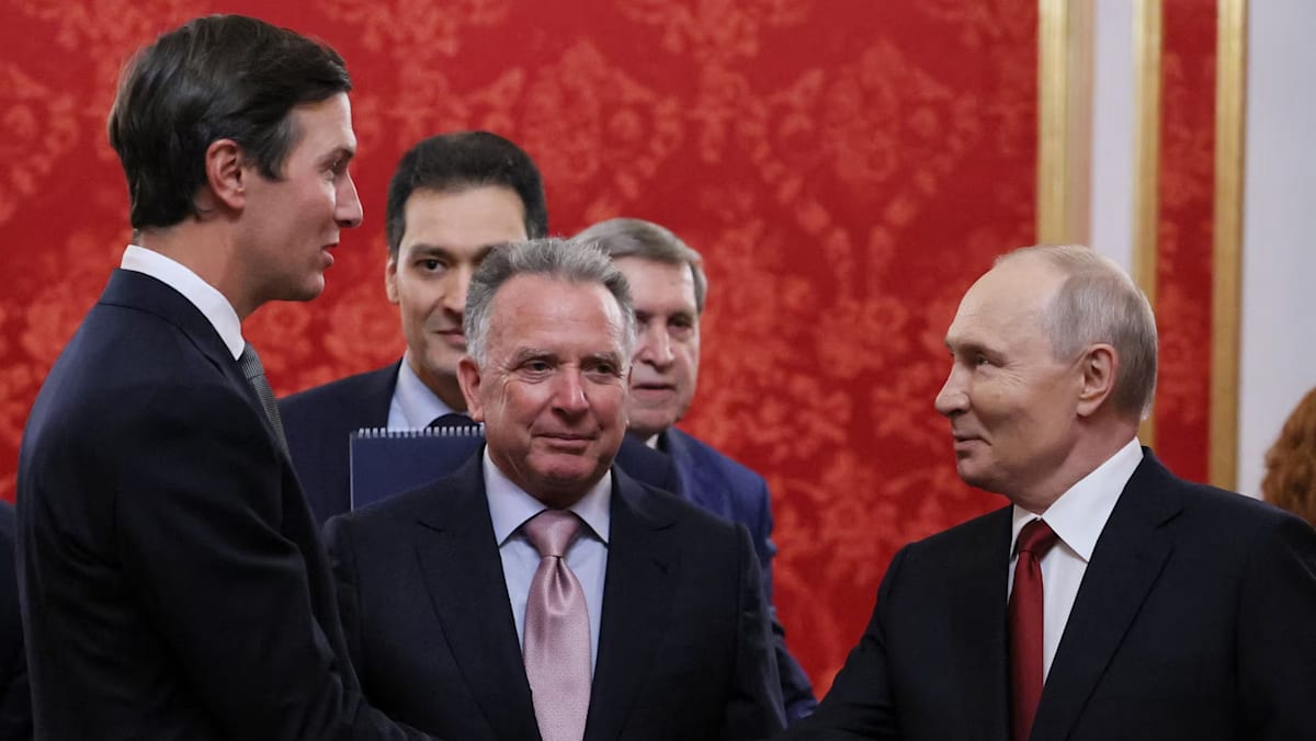 Putin meets US envoys