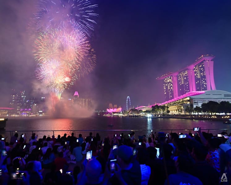 Large crowds gather at Marina Bay and Sentosa as Singapore rings in 2026