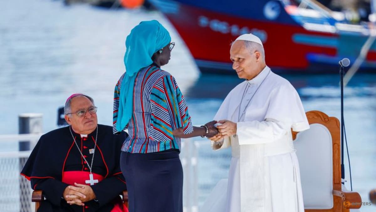 Pope condemns 'indifference' towards migrants on C