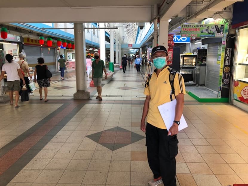 Mr Gor Hor, a safe distancing ambassador, seen in front of the stretch of shops at Boon Keng which he patrols.