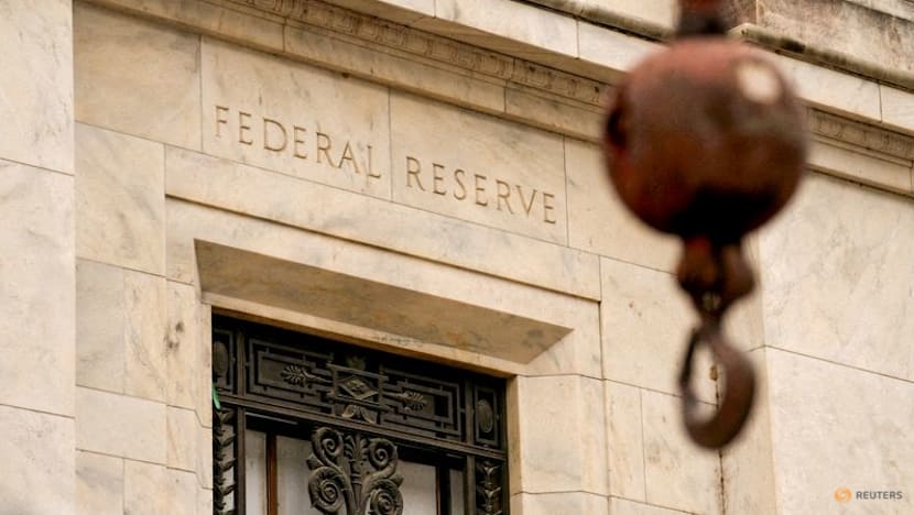 Stocks slump after Fed keeps rates unchanged as oil prices climb