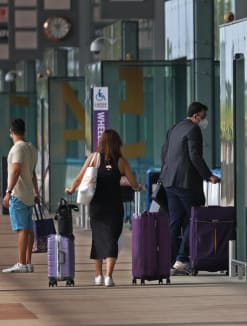 File photo of travellers at Changi Airport Terminal 3 on Oct 19, 2021.