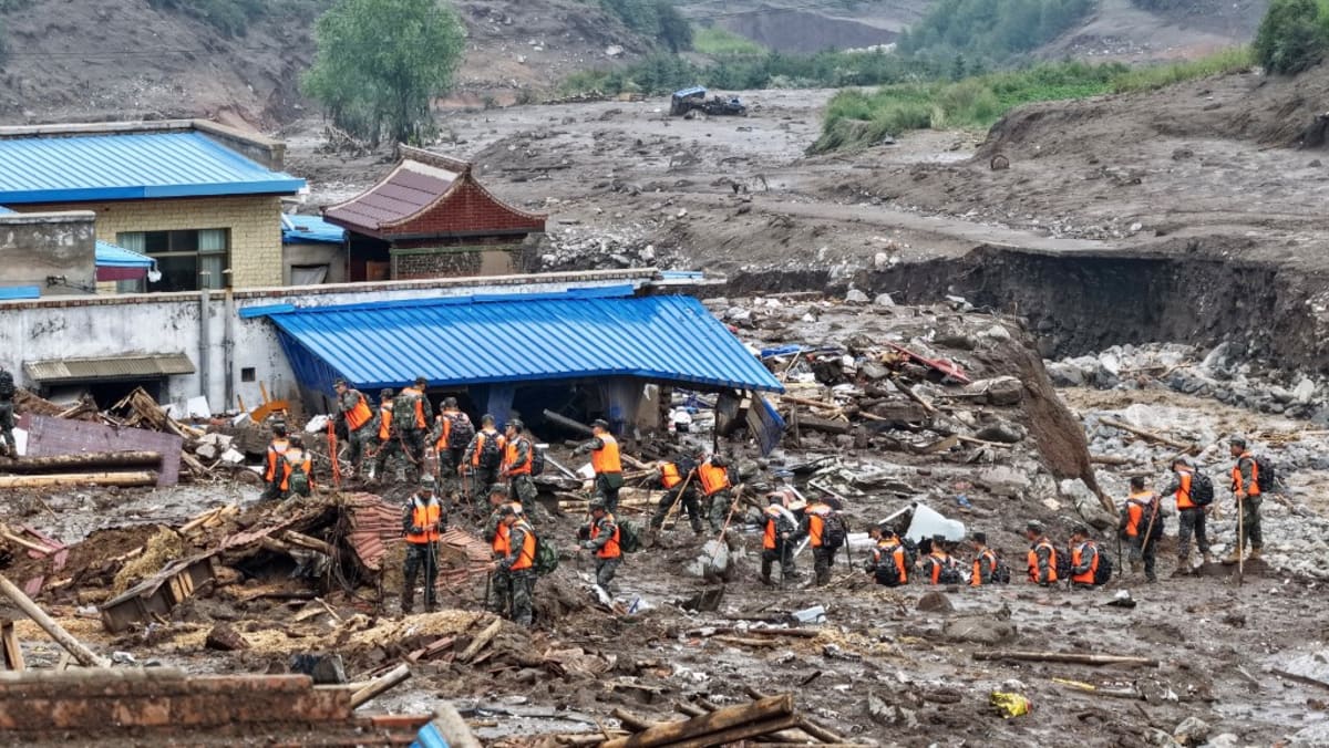 Death toll from northwest China floods rises to 13