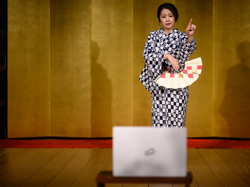 Japanese geisha "Chacha", who asked to be identified by a pseudonym, dancing during an online drinking party, in Hakone, Kanagawa Prefecture, on June 13, 2020.