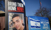 Hamas says fate of US-Israeli hostage unknown after guard killed in Israel strike