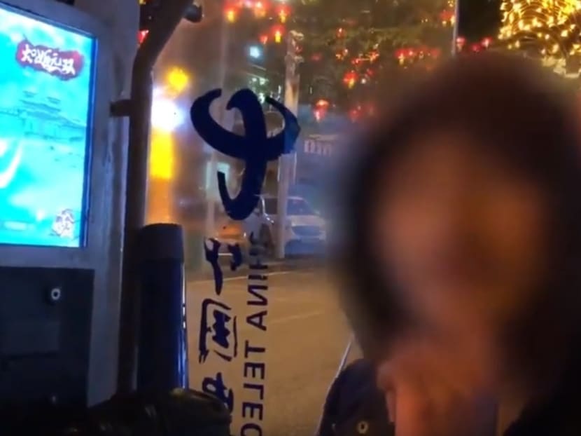 This Chinese man has for years hacked a phone booth in Chongqing for free movies and video games.