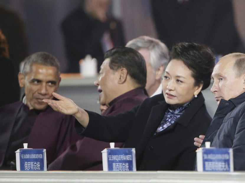 China censors wipe clip of Putin draping coat over Xi Jinping’s wife