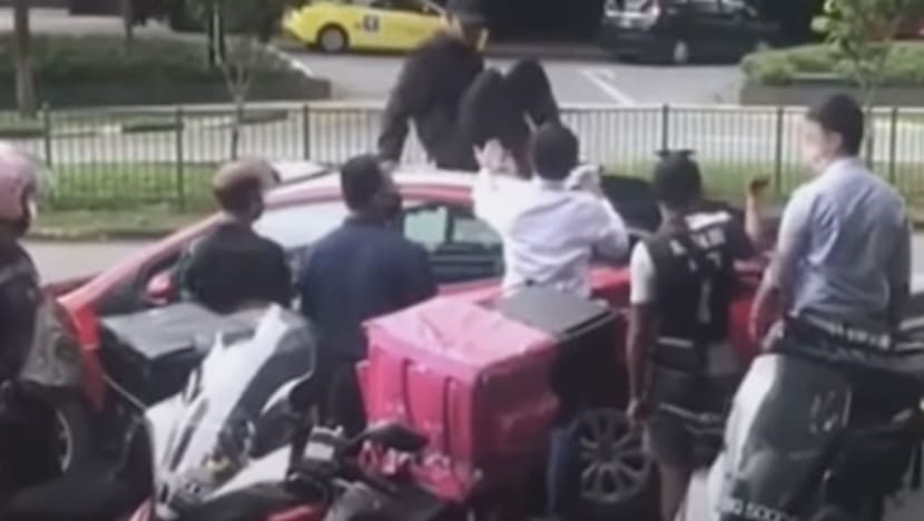 Man jailed after jumping onto moving taxi with estranged wife inside, sitting on its roof