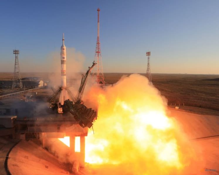 Russia sends American and two cosmonauts to space station with rare NASA chief visit