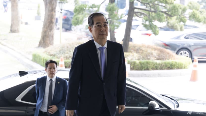 South Korean court reinstates impeached PM Han Duck-soo as acting president South Korean court reinstates impeached PM Han Duck-soo as acting president