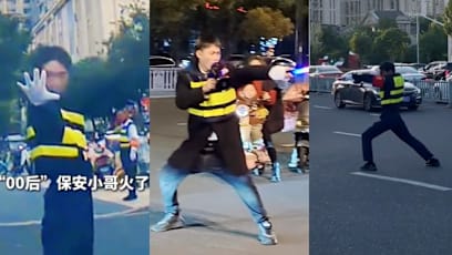 Parking Attendant In China, 18, Goes Viral For Turning Traffic Duty Into Dance Show