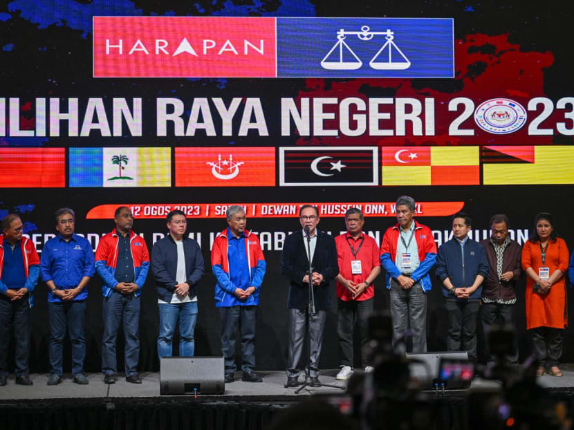 Malaysia's Prime Minister Anwar Ibrahim (centre) speaks during a press conference after the release of state election results at the World Trade Centre in Kuala Lumpur on Aug 12, 2023. Malaysia's Prime Minister Anwar Ibrahim (centre) speaks during a press conference after the release of state election results at the World Trade Centre in Kuala Lumpur on Aug 12, 2023.