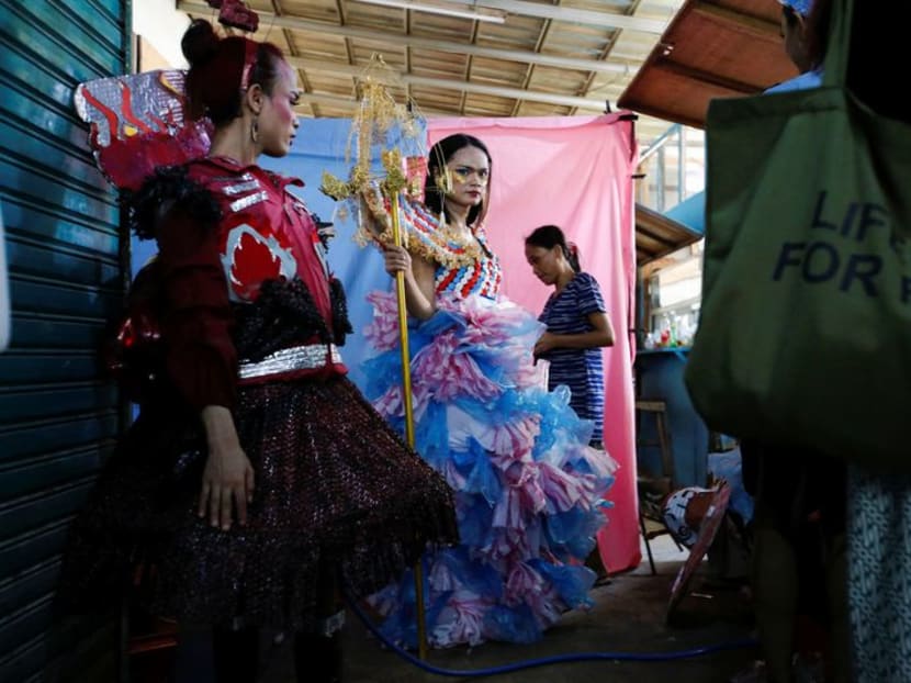 Indonesian transgender models shine spotlight on pollution with plastic fashion