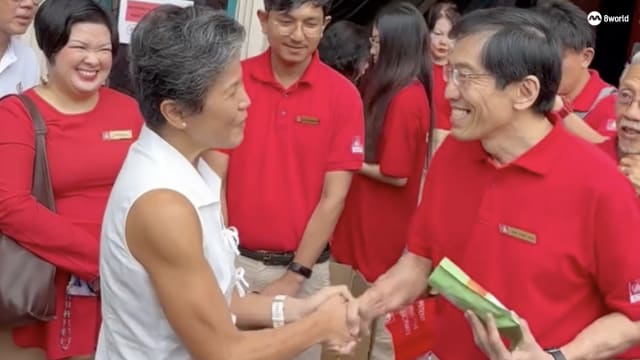 不约而同走访三巴旺西 傅丽珊与徐顺全友好握手问好