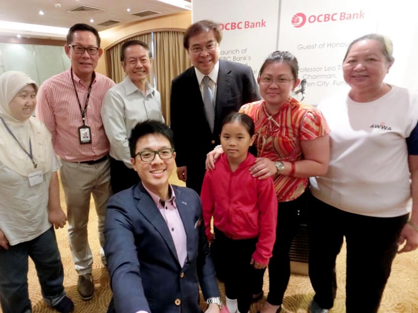 Four of OCBC’s charity partners including AWWA, Care Corner, Food from the Heart and Minds were at the launch of the expanded CSR

programme with OCBC Group. Photo: OCBC