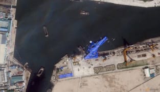 North Korea detains 3 officials over warship launch accident: State media