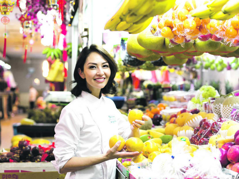 Host-actress Angela May adds a chef’s toque to the many hats she wears
