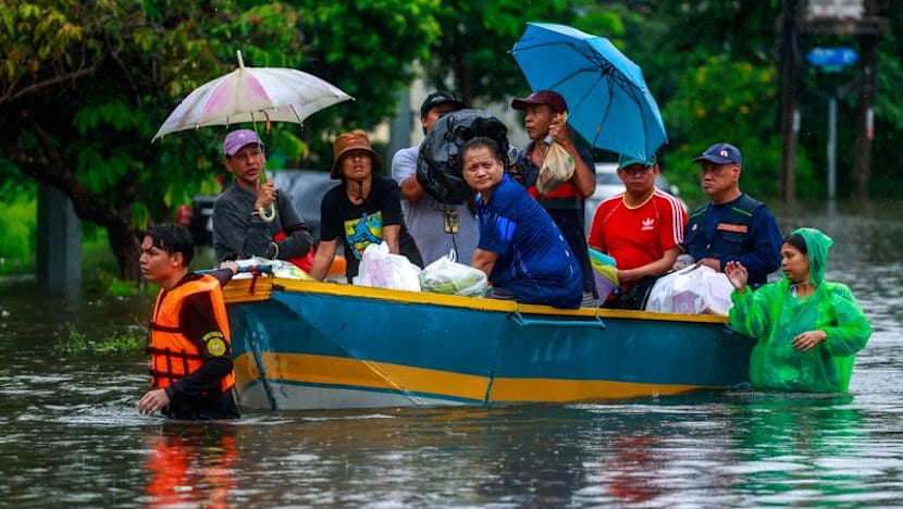 Bangkok floodwaters recede as officials race to drain canals