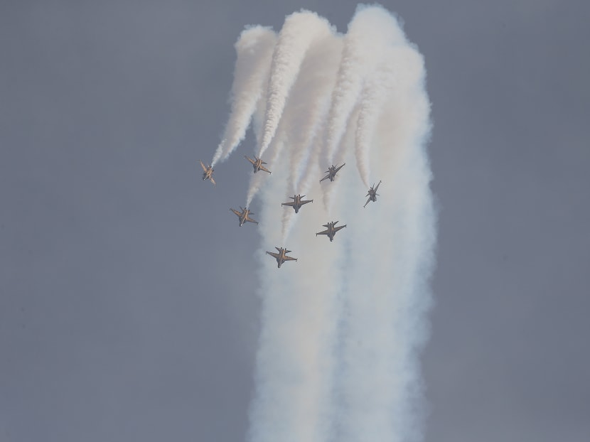 The Republic of Korea Air Force Black Eagles aerobatic team performing an aerial display during the Singapore Airshow 2016 official media conference. Photo: Don Wong