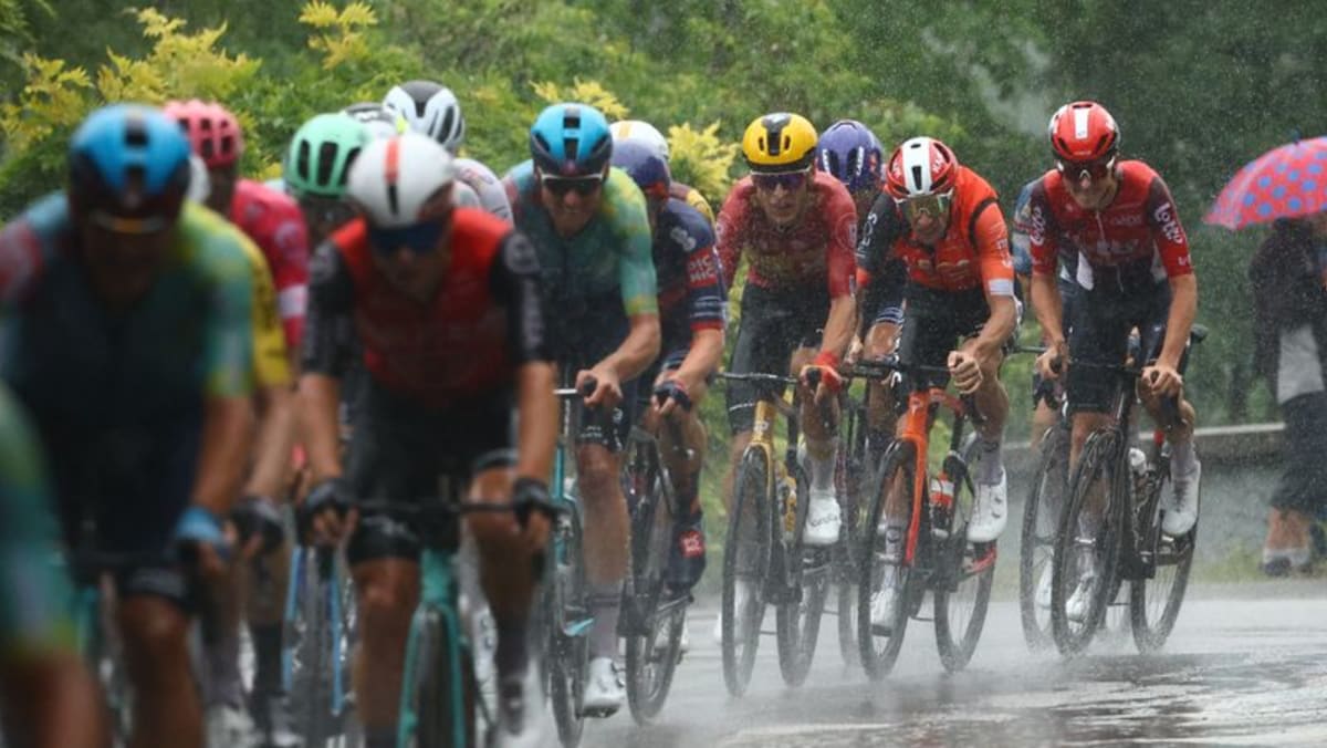 Tour de France final stage neutralised after slippery road conditions